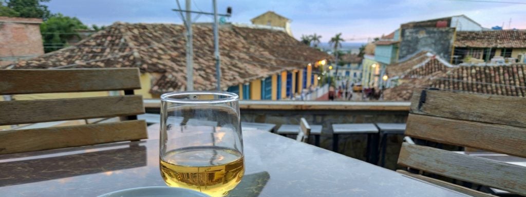 Photo of Rum with Trinidad in background